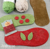 All the pieces for Joes' Toes Cherry crochet slipper kit in U.S. women's sizes 3-14 with suede soles