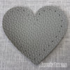 Joe's Toes dark grey heart shaped patch with stitch holes