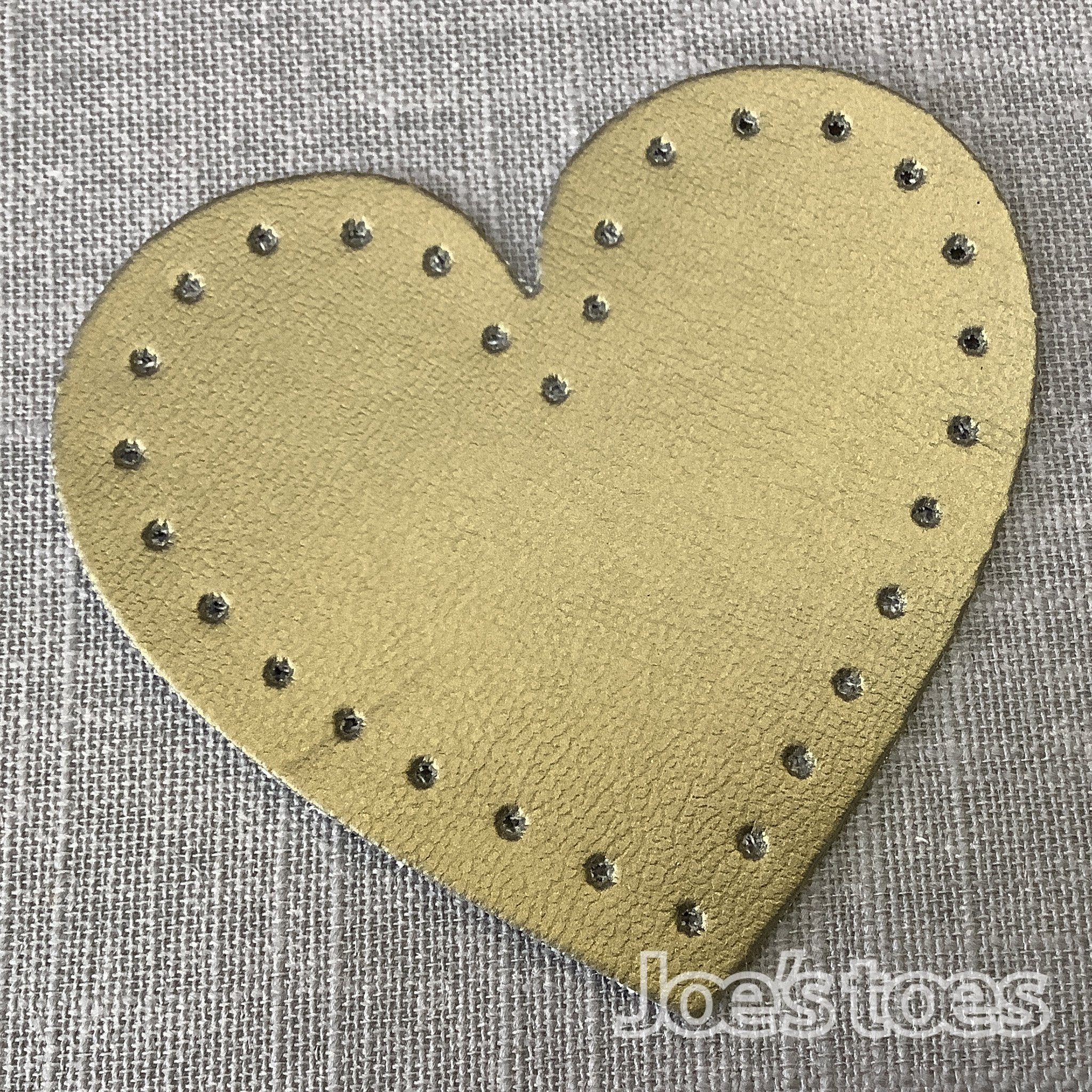 Joe's Toes heart shape sew-on patches with punched holes for easy