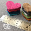 Joe's Toes small felt hearts in ten colours stacked against ruler