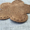 Suede flower shaped patch 87mm diameter with stitch holes brown color side view